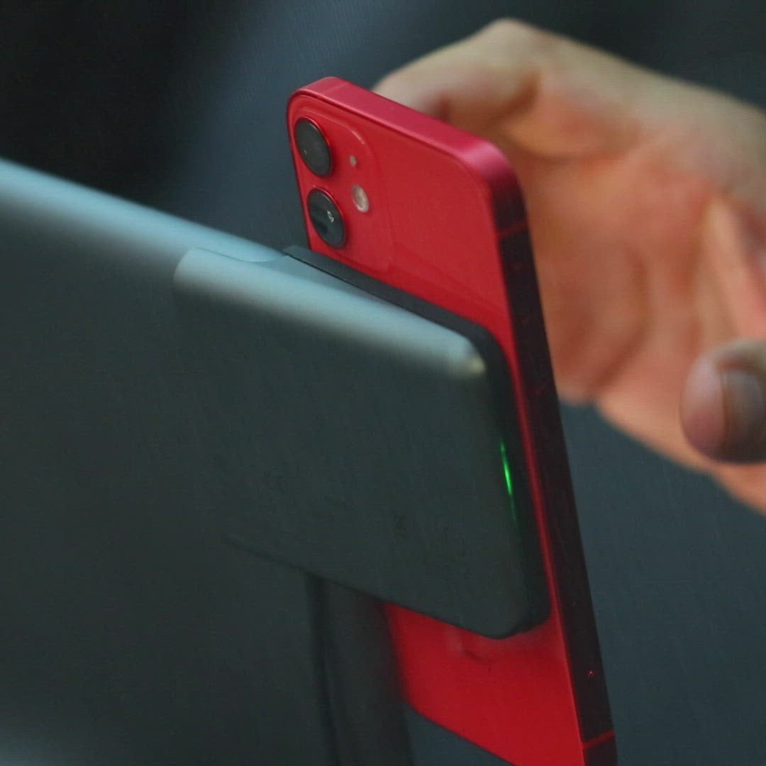 Different phones mounting on Tesla wireless charger