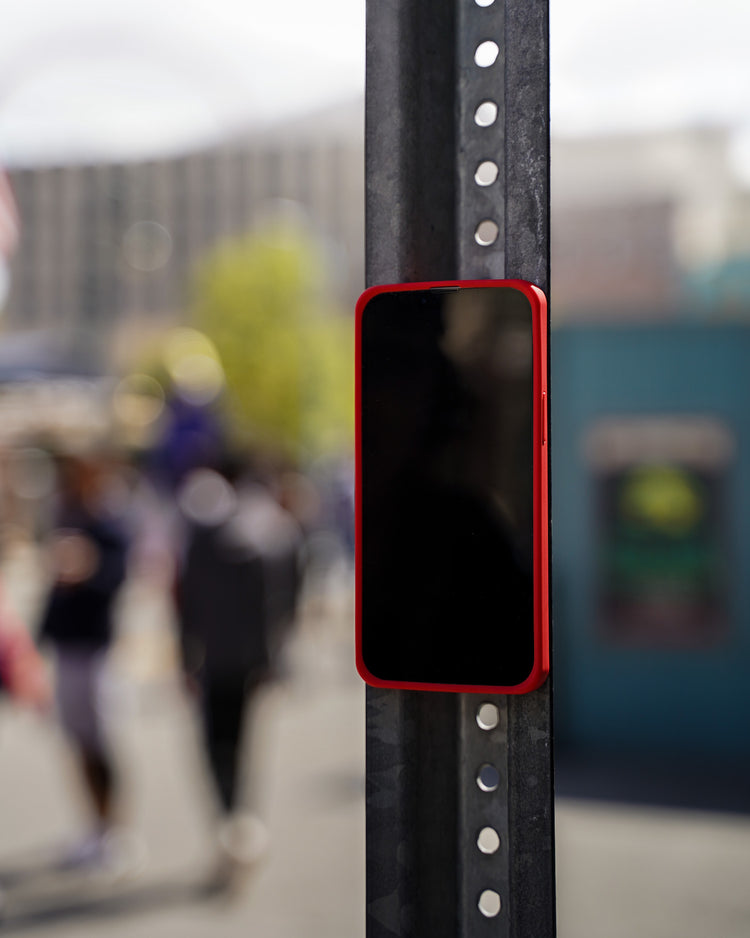 Mounting iPhone with a MagBak case on a metal street sign pole. 