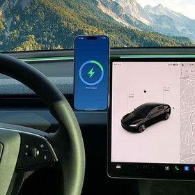 iPhone mounted on Left Hand Tesla wireless charger 